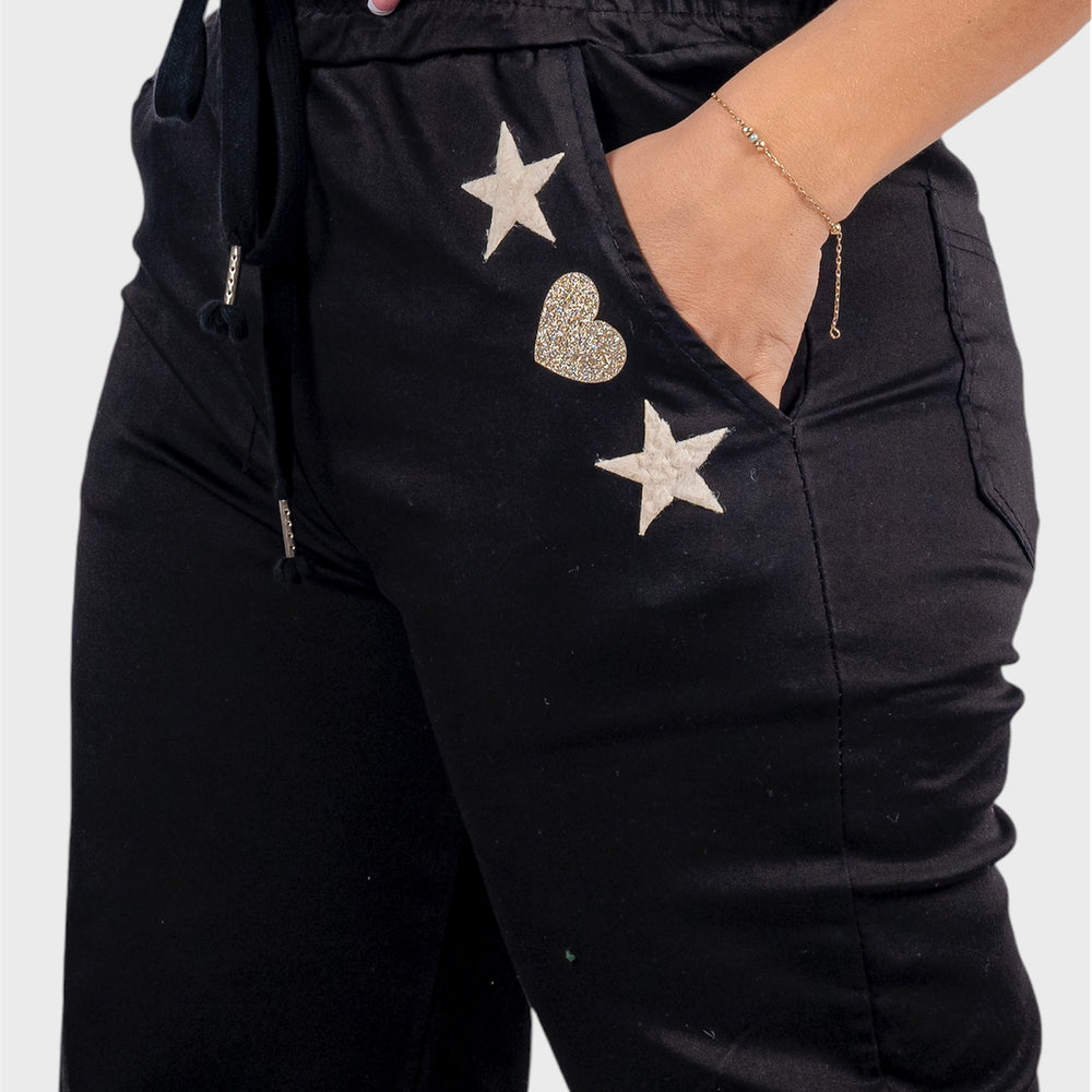 
                      
                        PANTALON ESTRELLA CORAZON
                      
                    